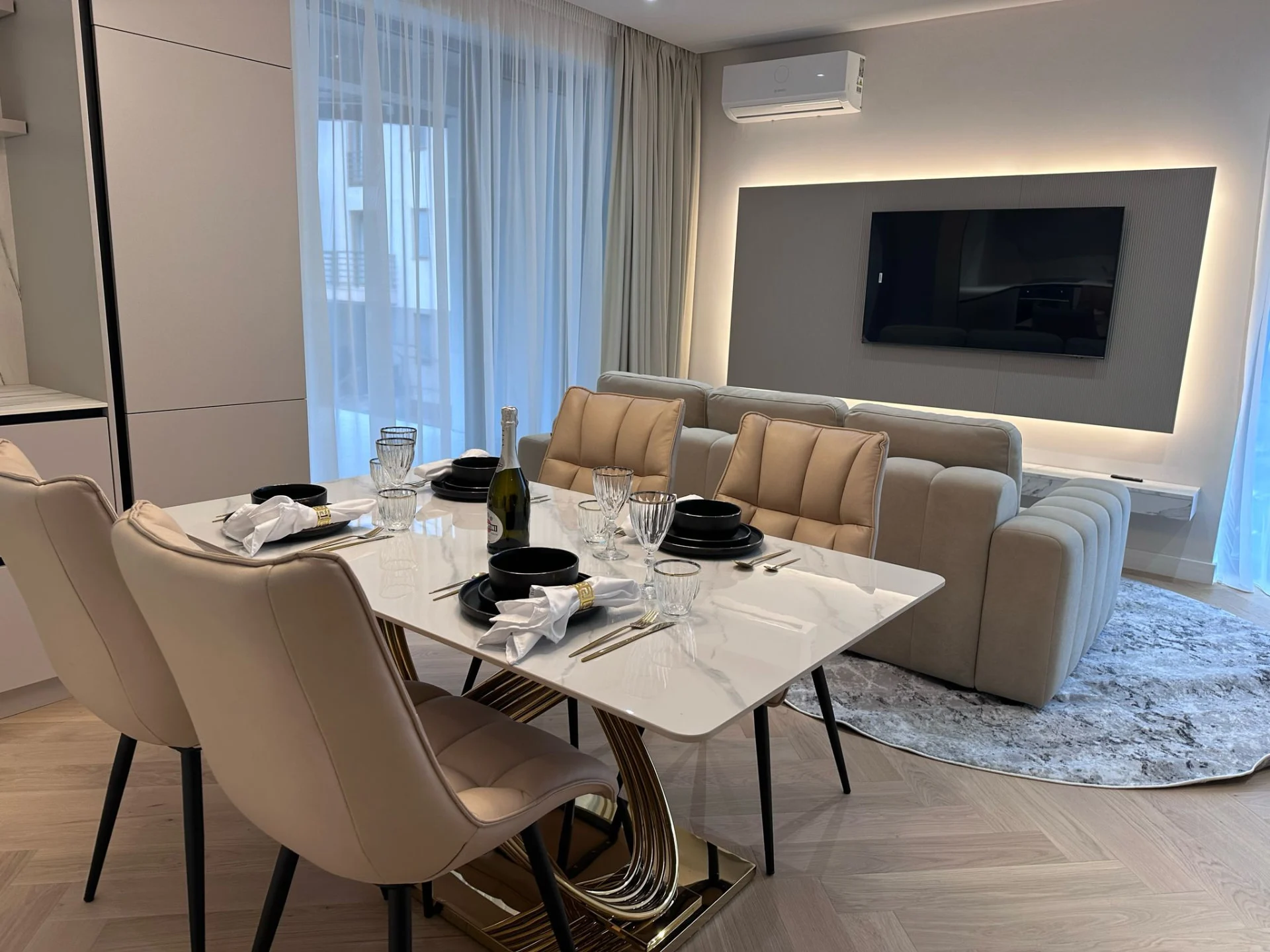 Custom TV unit and fitted living-room furniture in the Spanish holiday residence